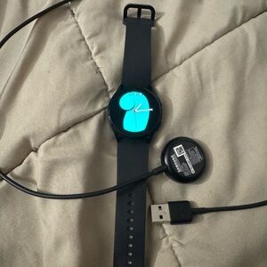 Samsung Black Smartwatch with Silicone Band with charger